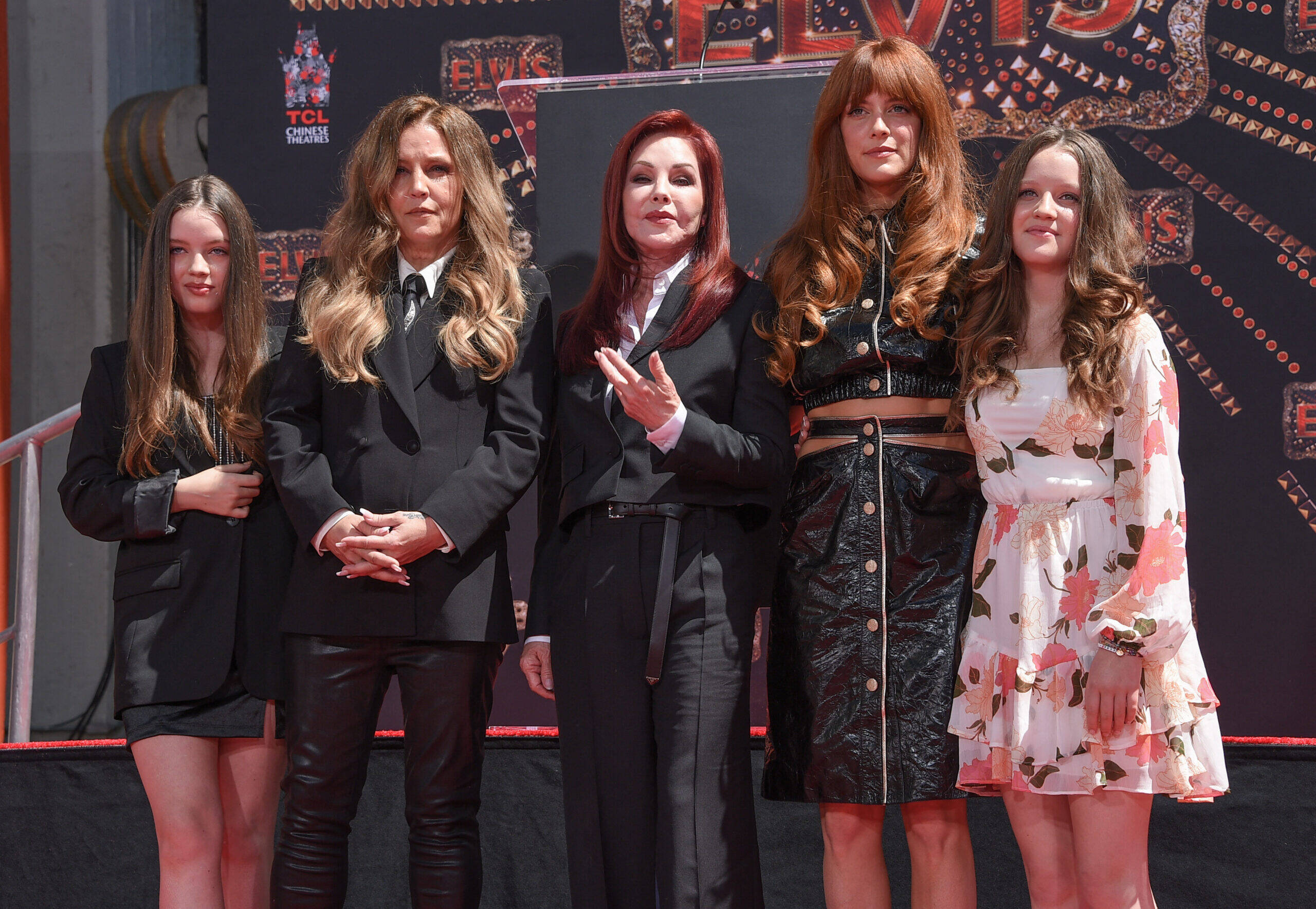 Priscilla Presley poses with Lisa Marie Presley and her daughters Riley Keough, Finley Lockwood, and Harper Lockwood at an event honoring Elvis